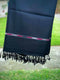 Our Pashmina black wool shawl is luxuriously crafted with a harmonious blend of fine wool and silk poly blend. It's lightweight and provides superior insulation so you'll always remain cozy without the worry of added bulk. Thi s timeless piece is idea.
